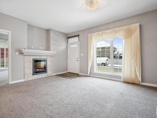 4408 Mccrae Avenue, Edmonton, AB - Indoor Photo Showing Living Room With Fireplace