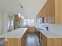 Main 5715 Hawthorn Common, Edmonton, AB  - Indoor Photo Showing Kitchen With Stainless Steel Kitchen With Upgraded Kitchen 