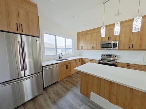 Main 5715 Hawthorn Common, Edmonton, AB - Indoor Photo Showing Kitchen With Stainless Steel Kitchen With Double Sink With Upgraded Kitchen