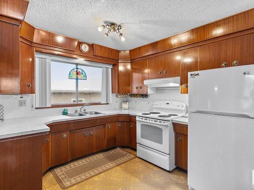 7308 149A Avenue, Edmonton, AB - Indoor Photo Showing Kitchen With Double Sink