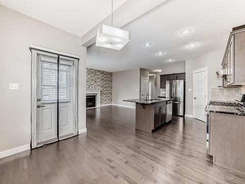 3855 170 Avenue, Edmonton, AB - Indoor Photo Showing Kitchen With Fireplace