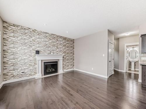 3855 170 Avenue, Edmonton, AB - Indoor Photo Showing Living Room With Fireplace