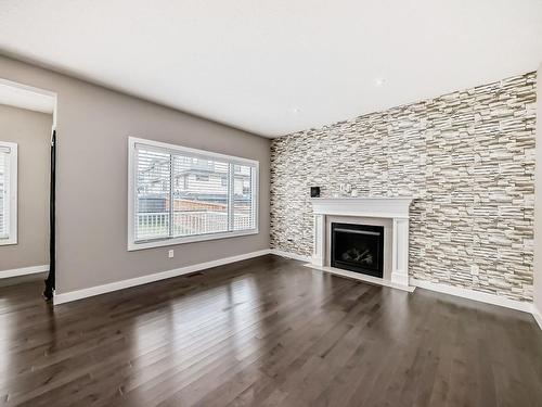 3855 170 Avenue, Edmonton, AB - Indoor Photo Showing Living Room With Fireplace