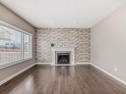 3855 170 Avenue, Edmonton, AB - Indoor Photo Showing Living Room With Fireplace