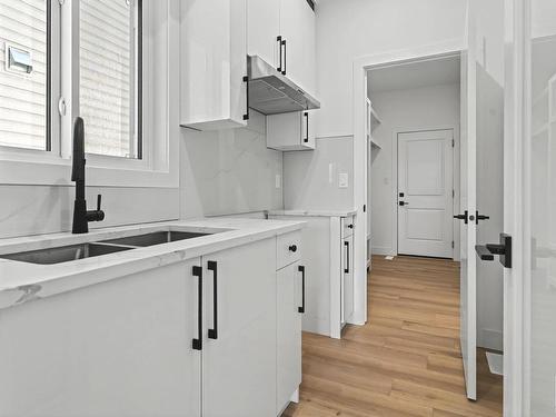 439 Roberts Crescent, Leduc, AB - Indoor Photo Showing Kitchen With Double Sink