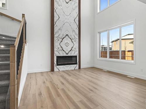 439 Roberts Crescent, Leduc, AB - Indoor Photo Showing Other Room With Fireplace