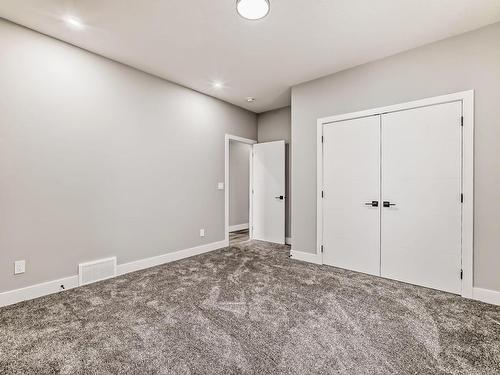 128 Edgewater Circle, Leduc, AB - Indoor Photo Showing Other Room