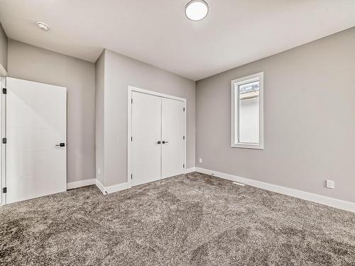 128 Edgewater Circle, Leduc, AB - Indoor Photo Showing Other Room