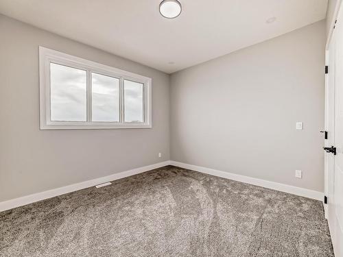 128 Edgewater Circle, Leduc, AB - Indoor Photo Showing Other Room