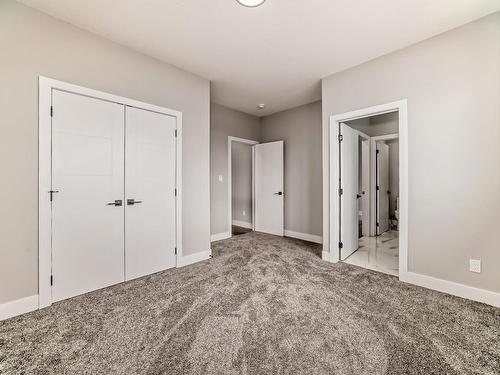 128 Edgewater Circle, Leduc, AB - Indoor Photo Showing Other Room