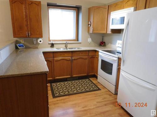 47 Arcand Drive, St. Albert, AB - Indoor Photo Showing Kitchen With Double Sink