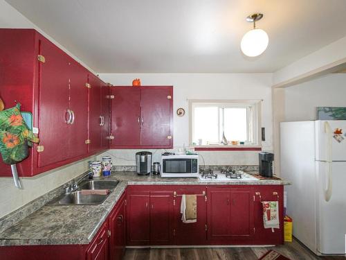 4708 50 Street, Myrnam, AB - Indoor Photo Showing Kitchen With Double Sink