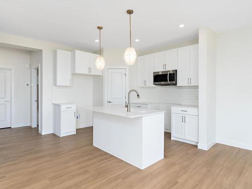 3246 Chernowski Way, Edmonton, AB - Indoor Photo Showing Kitchen With Upgraded Kitchen