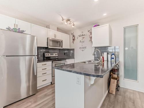 331 390 Windermere Road Nw, Edmonton, AB - Indoor Photo Showing Kitchen With Double Sink