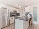 331 390 Windermere Road Nw, Edmonton, AB  - Indoor Photo Showing Kitchen With Double Sink 