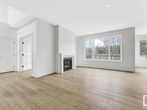 4 Harrow Close, Ardrossan, AB - Indoor Photo Showing Living Room With Fireplace