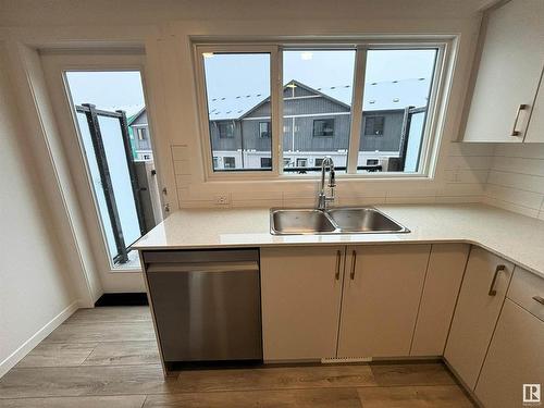 116 1025 Secord Promenade, Edmonton, AB - Indoor Photo Showing Kitchen With Double Sink