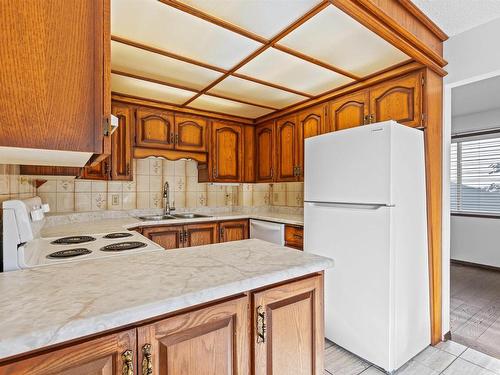 2111 104B Street, Edmonton, AB - Indoor Photo Showing Kitchen With Double Sink