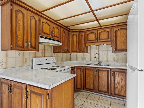 2111 104B Street, Edmonton, AB - Indoor Photo Showing Kitchen With Double Sink