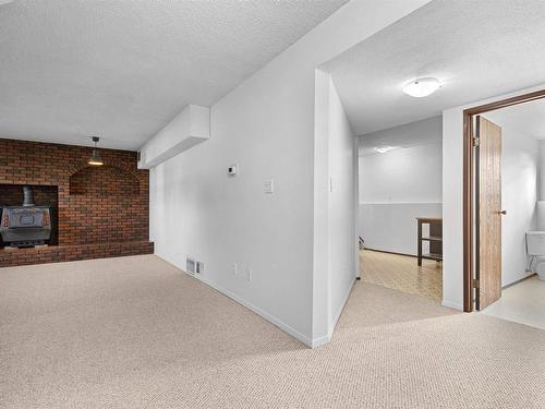 2111 104B Street, Edmonton, AB - Indoor Photo Showing Other Room With Fireplace