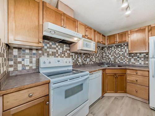 212 245 Edwards Drive, Edmonton, AB - Indoor Photo Showing Kitchen With Double Sink