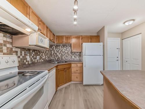 212 245 Edwards Drive, Edmonton, AB - Indoor Photo Showing Kitchen With Double Sink