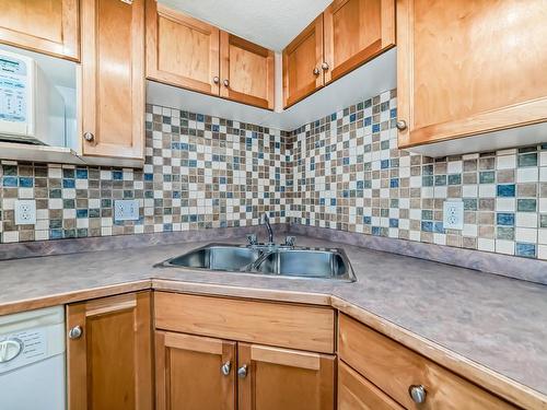 212 245 Edwards Drive, Edmonton, AB - Indoor Photo Showing Kitchen With Double Sink