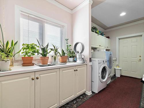 17 Osprey Point(E), St. Albert, AB - Indoor Photo Showing Laundry Room