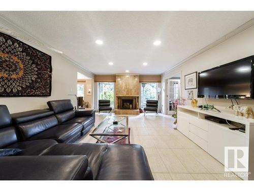 4 14812 45 Avenue, Edmonton, AB - Indoor Photo Showing Living Room With Fireplace