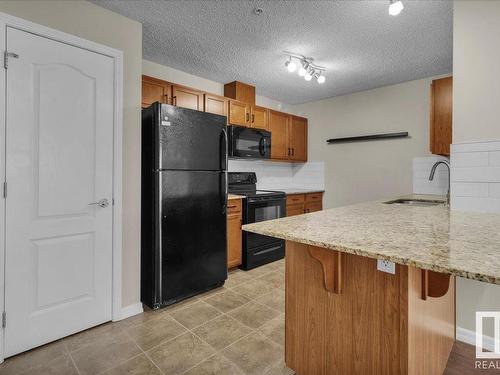 210 273 Charlotte Way, Sherwood Park, AB - Indoor Photo Showing Kitchen