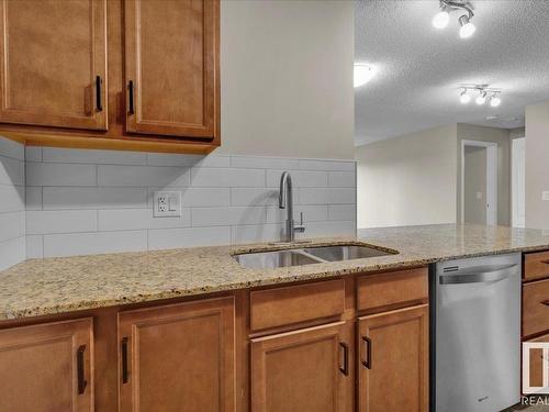 210 273 Charlotte Way, Sherwood Park, AB - Indoor Photo Showing Kitchen With Double Sink