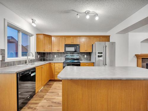 14048 149 Avenue, Edmonton, AB - Indoor Photo Showing Kitchen With Double Sink