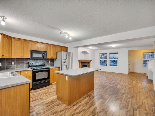 14048 149 Avenue, Edmonton, AB - Indoor Photo Showing Kitchen With Double Sink