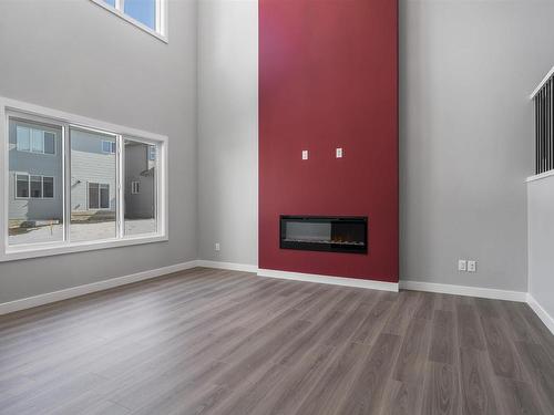 1311 16 Street, Edmonton, AB - Indoor Photo Showing Living Room With Fireplace