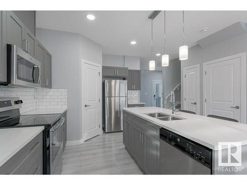 215 41 Avenue, Edmonton, AB - Indoor Photo Showing Kitchen With Stainless Steel Kitchen With Double Sink With Upgraded Kitchen