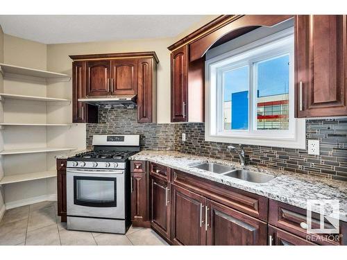 1004 Wildwood Court, Edmonton, AB - Indoor Photo Showing Kitchen With Double Sink