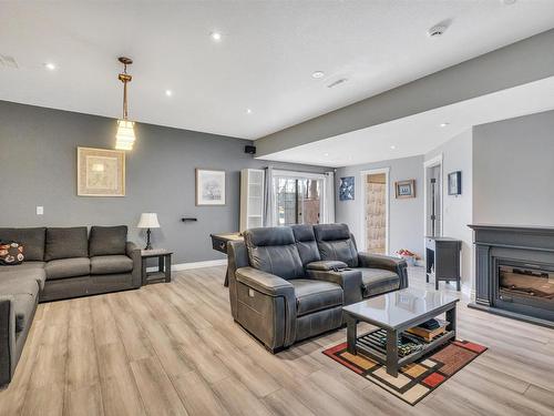 104 Linksview Drive, Spruce Grove, AB - Indoor Photo Showing Living Room With Fireplace