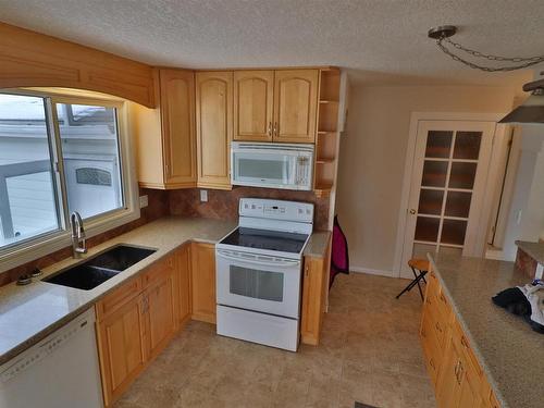 23212 Twp Rd 484, Rural Leduc County, AB - Indoor Photo Showing Kitchen With Double Sink