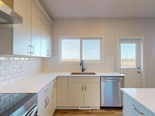 4604 72 Avenue, Beaumont, AB - Indoor Photo Showing Kitchen With Double Sink