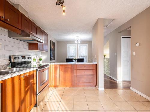 14167 26 Street, Edmonton, AB - Indoor Photo Showing Kitchen With Stainless Steel Kitchen