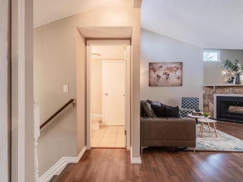 14167 26 Street, Edmonton, AB - Indoor Photo Showing Other Room With Fireplace