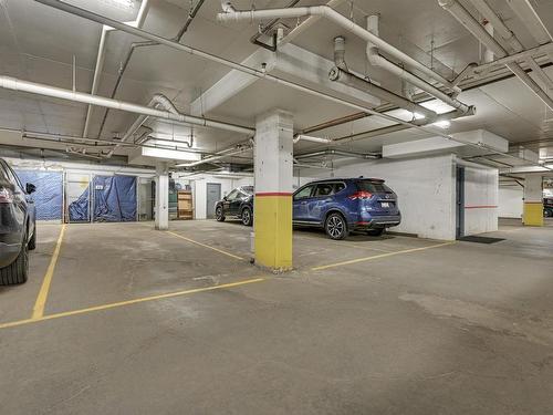 312 9008 99 Avenue, Edmonton, AB - Indoor Photo Showing Garage