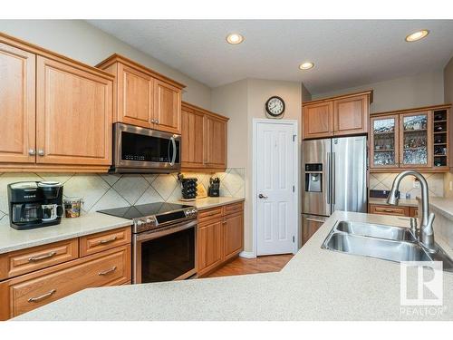 6 Woods Court, Leduc, AB - Indoor Photo Showing Kitchen With Stainless Steel Kitchen With Double Sink