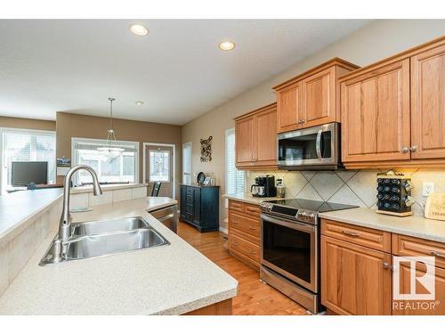 6 Woods Court, Leduc, AB - Indoor Photo Showing Kitchen With Double Sink