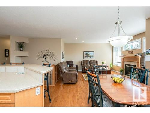 6 Woods Court, Leduc, AB - Indoor Photo Showing Other Room With Fireplace