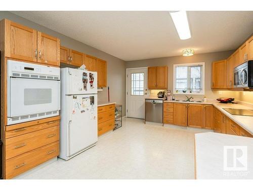 13 Century Villas Close, Fort Saskatchewan, AB - Indoor Photo Showing Kitchen With Double Sink