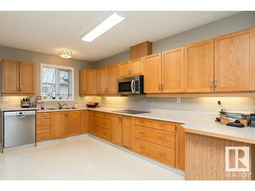 13 Century Villas Close, Fort Saskatchewan, AB - Indoor Photo Showing Kitchen With Double Sink