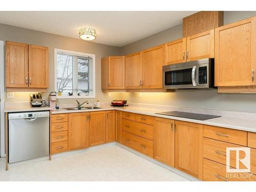 13 Century Villas Close, Fort Saskatchewan, AB - Indoor Photo Showing Kitchen With Double Sink