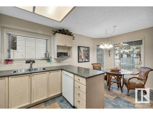 148 Oeming Road, Edmonton, AB - Indoor Photo Showing Kitchen With Double Sink