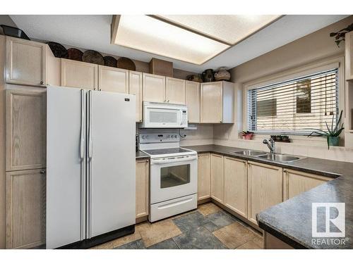 148 Oeming Road, Edmonton, AB - Indoor Photo Showing Kitchen With Double Sink